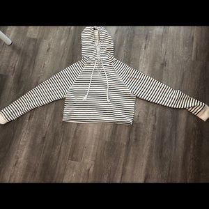 Black and white striped cropped hoodie.